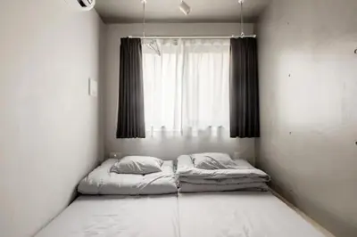 a bed in a room with a window at Marvelous Ryogoku - Vacation STAY 74212v in Tokyo