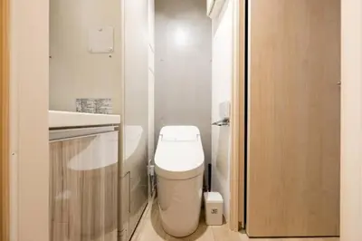 a small bathroom with a toilet and a sink at Marvelous Ryogoku - Vacation STAY 74214v in Tokyo