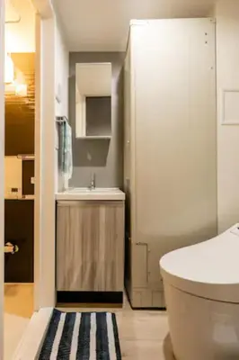 a bathroom with a white toilet and a sink at Marvelous Ryogoku - Vacation STAY 74214v in Tokyo