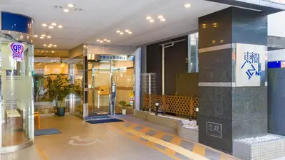 a lobby of a building with a glass door at Toyoko Inn Tokyo Kamata Higashi-guchi in Tokyo