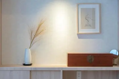 a vase sitting on top of a shelf with a wall at STone Hotel in Tokyo