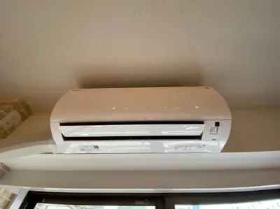 a white printer sitting on top of a shelf at Great location Only 1 minute to St G-18 Ginza Line in Tokyo