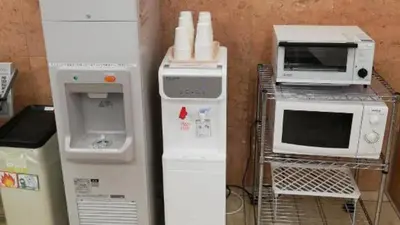 a group of microwaves and other appliances in a room at Toyoko Inn Tokyo Akabane-eki Higashi-guchi Ichiban-gai in Tokyo