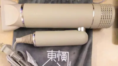 two hair dryers sitting on top of a bag at Toyoko Inn Tokyo Uguisudani Ekimae in Tokyo