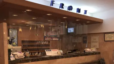 a fast food restaurant with a sign above a counter at Toyoko Inn Tokyo Yamanote sen Otsuka eki Kita guchi No 2 in Tokyo