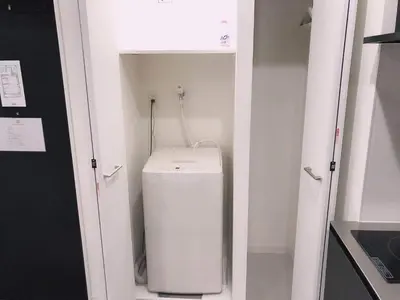 a bathroom with a toilet in a small room at Asakusa New City Hotel in Tokyo