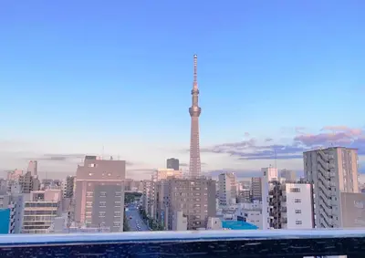 a view of a city with a tower in the background at the Moto Hotel Asakusa in Tokyo