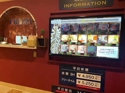 a flat screen tv on a wall in a store at Restay lagoon in Tokyo