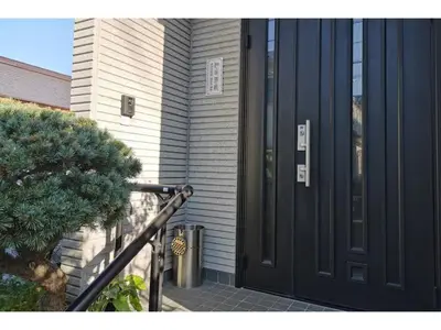 a black door on the side of a house at NYOZE House - Vacation STAY 84305v in Tokyo