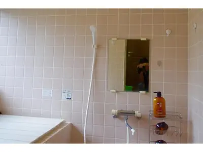 a bathroom with a sink and a mirror at NYOZE House - Vacation STAY 84305v in Tokyo
