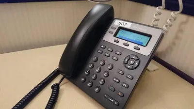 a black phone sitting on top of a desk at Toyoko Inn Tokyo Otemachi in Tokyo