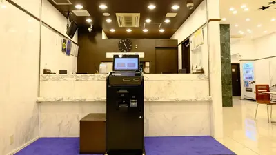an atm machine in a lobby of a store at Toyoko Inn Tokyo Nihombashi Zeimusho Mae in Tokyo