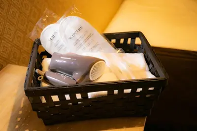 a basket filled with hair products on a table at Apartment Sun Bright - Vacation STAY 89260v in Tokyo