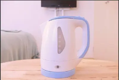 a white and blue blender sitting on a table at Tokyo Stay Excel Shinjuku in Tokyo