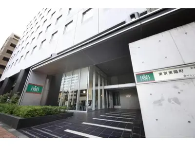 a building with a sign in front of it at R&B Hotel Tokyo Toyocho - Vacation STAY 40490v in Tokyo