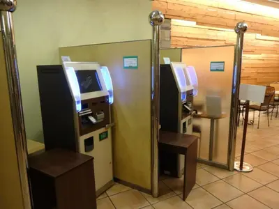 a row of machines in a room with a table at R&B HOTEL HIGASHI NIHONBASHI - Vacation STAY 40468v in Tokyo