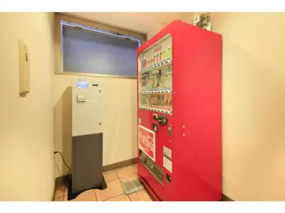 a red cocacola machine in a room at R&B HOTEL HIGASHI NIHONBASHI - Vacation STAY 40472v in Tokyo