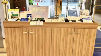 a wooden counter in a store with signs on it at Toyoko Inn Tokyo Ikebukuro Kita guchi No 2 in Tokyo