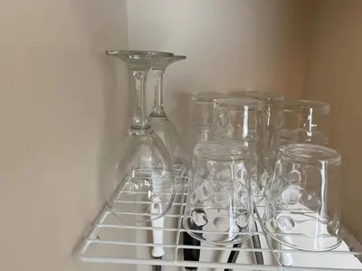 a group of glass vases sitting on a shelf at Peace Inn SkytreeTokyo - Vacation STAY 71958v in Tokyo