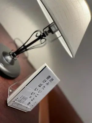 a lamp with a sign on a table next to a light at No, 2 Taniji Building - Vacation STAY 92282v in Tokyo