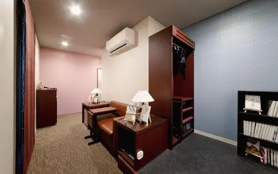 a room with a bed and a desk with a lamp at No, 2 Taniji Building - Vacation STAY 92282v in Tokyo