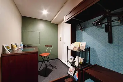 a room with a desk and a podium in a room at No, 2 Taniji Building - Vacation STAY 91383v in Tokyo