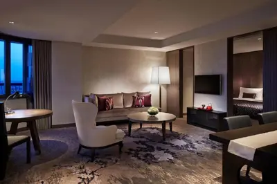 a hotel room with a couch and a table at Tokyo Marriott Hotel in Tokyo