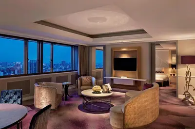 a large hotel room with a view of a city at Tokyo Marriott Hotel in Tokyo