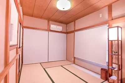 a room with white walls and a wooden ceiling at FuwaFuwa - Vacation STAY 12411 in Tokyo