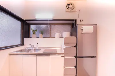 a kitchen with a refrigerator and a sink at FuwaFuwa - Vacation STAY 12411 in Tokyo