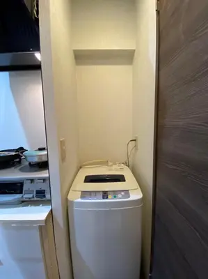 a small bathroom with a toilet in a room at Takemura Building 2nd floor in Tokyo