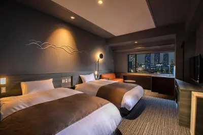 a hotel room with two beds and a window at La Vista Tokyo Bay in Tokyo