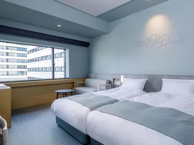 a hotel room with a bed and a window at La Vista Tokyo Bay in Tokyo