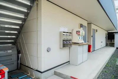 an empty building with a drink dispenser on the side at E JOY INN-Okubo branch in Tokyo