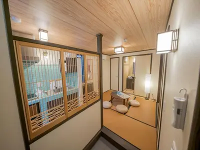 a room with a hallway with a room with a room at YADOYA Matsugaya in Tokyo