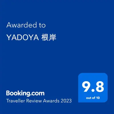 a blue screen with the text awarded to yodazazaza at YADOYA Negishi in Tokyo