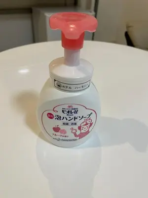 a bottle of laundry detergent sitting on a table at HotelHarmony\u65e5\u66ae\u91cc\u30db\u30c6\u30eb\u30cf\u30fc\u30e2\u30cb\u30fc in Tokyo