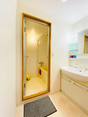 a bathroom with a sink and a mirror at Suny402-SJ0007 in Tokyo