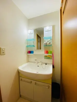 a bathroom with a sink and a mirror at Suny402-SJ0007 in Tokyo