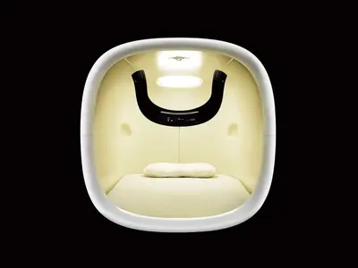 a room with a chair with a face on it at 9h nine hours woman Shinjuku in Tokyo