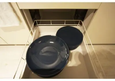 a blue toilet sitting in a shelf in a bathroom at Woody Sanheim - Vacation STAY 12558 in Tokyo