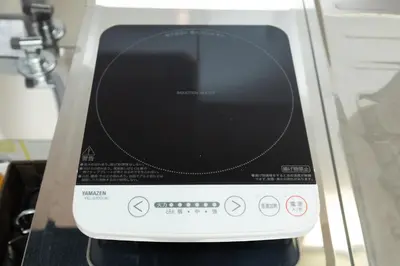 a small appliance sitting on top of a microwave at \u5510\u6ca2\u30db\u30c6\u30eb Karasawa-Hotel in Tokyo