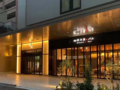 a store front of a building at night at Akabane Holic Hotel in Tokyo