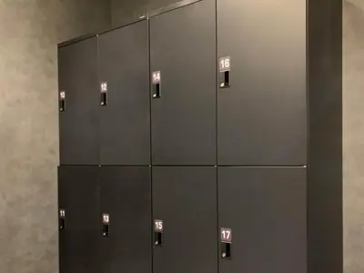 a row of lockers in a locker room at Akabane Holic Hotel in Tokyo