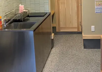 a kitchen with a sink and a counter top at YADOYA Iroha in Tokyo