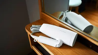 a nintendo wii game system sitting on a desk at Hotel Monte Hermana Tokyo in Tokyo