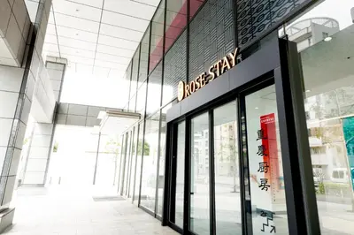 a store front of a building with a sign on it at Rose Stay Tokyo Shiba Park in Tokyo