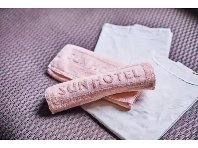 a pair of towels and a brush on a table at Urayasu Sun Hotel - Vacation STAY 33023v in Urayasu