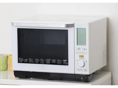 a white microwave sitting on top of a shelf at Urayasu Sun Hotel - Vacation STAY 33020v in Urayasu