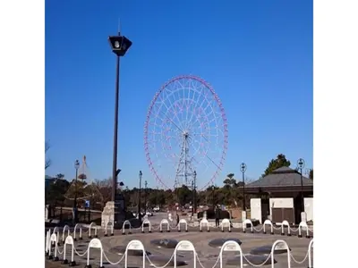 a ferris wheel in a park with white chairs at Urayasu Sun Hotel - Vacation STAY 33020v in Urayasu